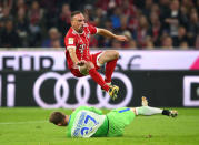 Soccer Football - Bundesliga - FC Bayern Munich vs VfL Wolfsburg - Allianz Arena, Munich, Germany - September 22, 2017 Bayern Munich's Franck Ribery in action with Wolfsburg's Maximilian Arnold REUTERS/Michael Dalder