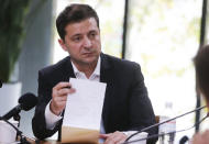 Ukrainian President Volodymyr Zelenskiy speaks during his long time talks with journalists in Kyiv, Ukraine, Thursday, Oct. 10, 2019. Zelenskiy is giving an all-day "press marathon" amid growing questions about his actions as president. (AP Photo/Efrem Lukatsky)