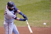 Minnesota Twins' Marwin Gonzalez hits an RBI double during the fourth inning of a baseball game against the Milwaukee Brewers Wednesday, Aug. 12, 2020, in Milwaukee. (AP Photo/Morry Gash)