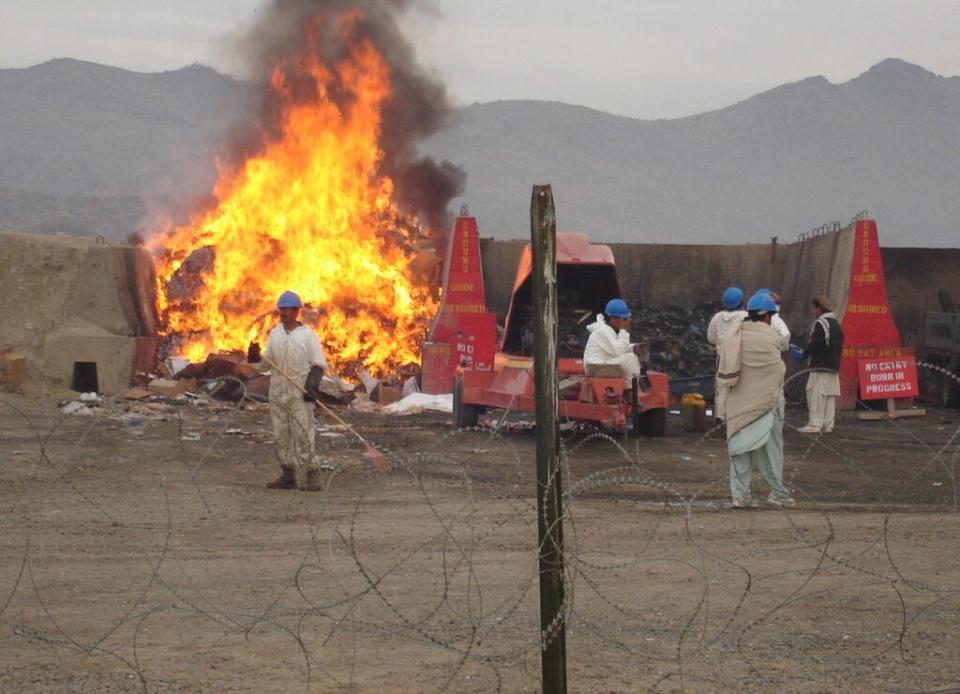 The U.S. military has often burned wastes and excess military equipment at foreign bases during wartime, including at this U.S. base in Afghanistan in 2006. Some veterans exposed to toxic fumes from burn pits are worried about their health.