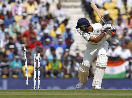 India's Ajinkya Rahane is bowled by South Africa's Morne Morkel (unseen) on the first day of their third test cricket match in Nagpur, India, November 25, 2015. REUTERS/Amit Dave