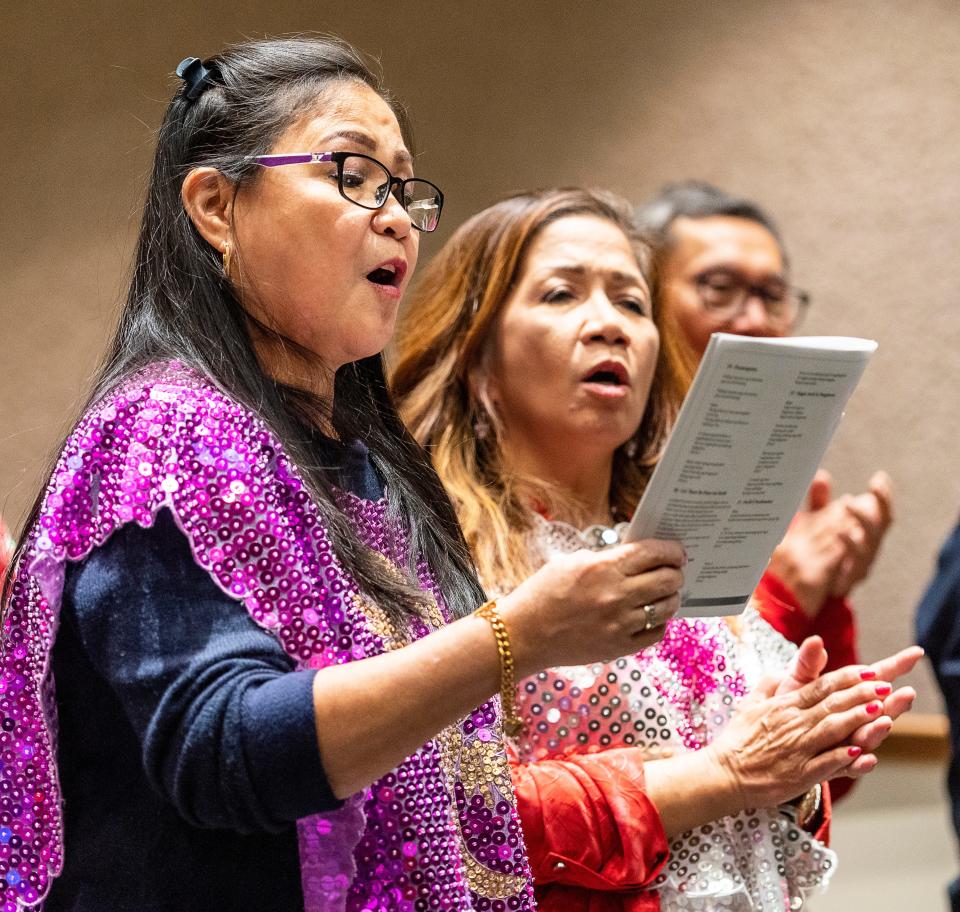 (Left) Jereza Guintu of Wauwatosa and (right) Corazon Tulod of Greenfield sing during the second of nine Masses for Simbang Gabi on Saturday December 16, at St. Alphonsus Parish 2023 in Greendale, Wis. 



Jovanny Hernandez / Milwaukee Journal Sentinel