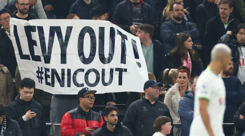  Tootenham fans with a 'Levy out' banner during their team's Premier League game against Manchester United in April 2023. 