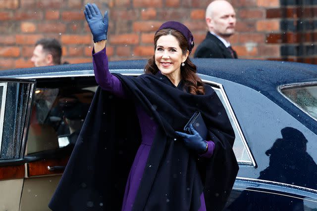 <p>MIKKEL BERG PEDERSEN/Ritzau Scanpix/AFP/Getty</p> Queen Mary of Denmark waves as she arrives for a church service on the occasion of the change of throne at Aarhus Cathedral on Jan. 21.