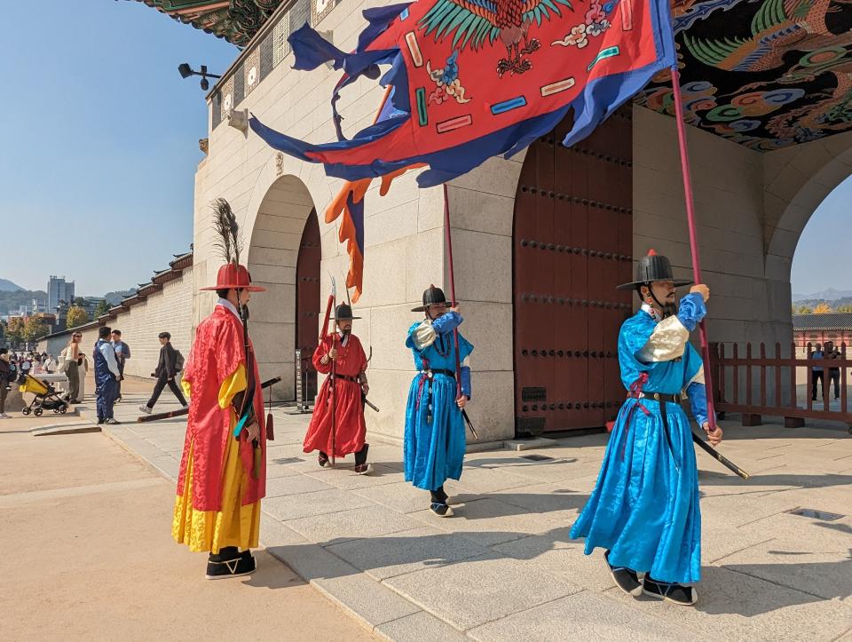 The changing of the guard ceremony at Gyeongbokgung Palace in Seoul, South Korea.