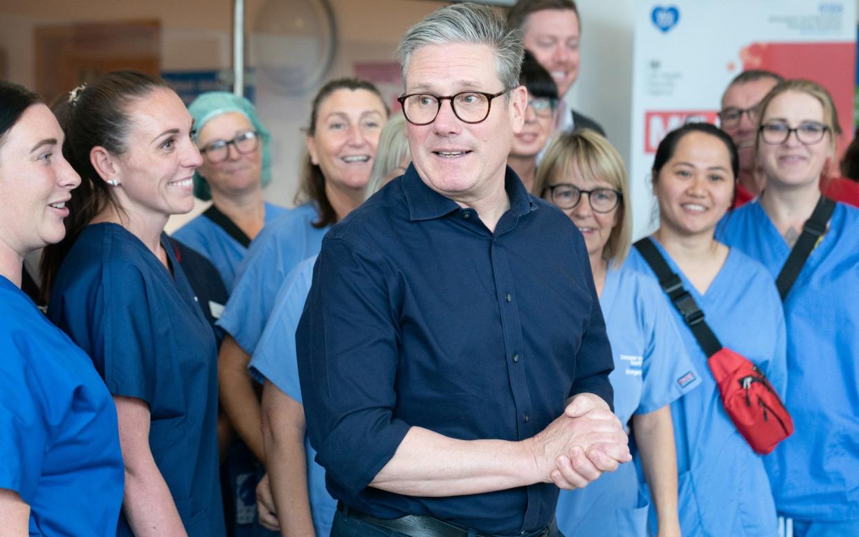 Sir Keir Starmer and meets staff at Bassetlaw Hospital in Nottinghamshire