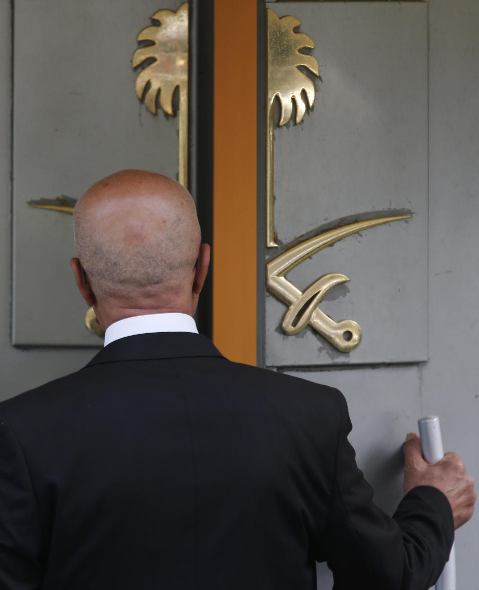 A man enters Saudi Arabia's consulate in Istanbul, Friday, Oct. 19, 2018. A Turkish official said Friday that investigators are looking into the possibility that the remains of missing Saudi journalist Jamal Khashoggi may have been taken to a forest in the outskirts of Istanbul or to another city — if and after he was killed inside the consulate earlier this month. (AP Photo/Lefteris Pitarakis)