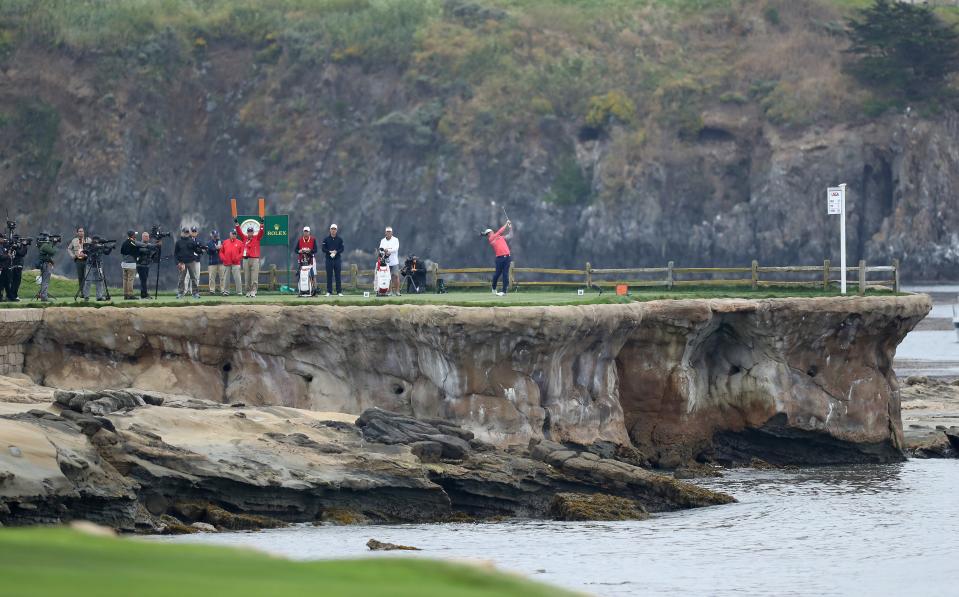 PEBBLE BEACH, CALIFORNIA - JUNE 16: Gary Woodland of the United States plays his tee shot on the par 5, 18th hole during the final round of the 2019 U.S.Open Championship at the Pebble Beach Golf Links on June 16, 2019 in Pebble Beach, California. (Photo by David Cannon/Getty Images)