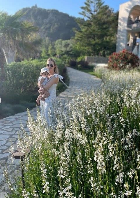 will kirk wife polly snowdon standing on path carrying daughter