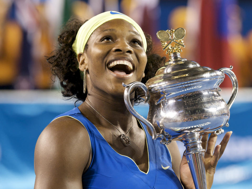 Serena Williams of the United States of America poses with the Daphne Akhurst Trophy after winning the women's final match against Dinara Safina of Russia at the Australian Open Tennis Grand Slam January 31, 2009 in Melbourne. (Photo by Victor Fraile/Corbis via Getty Images)