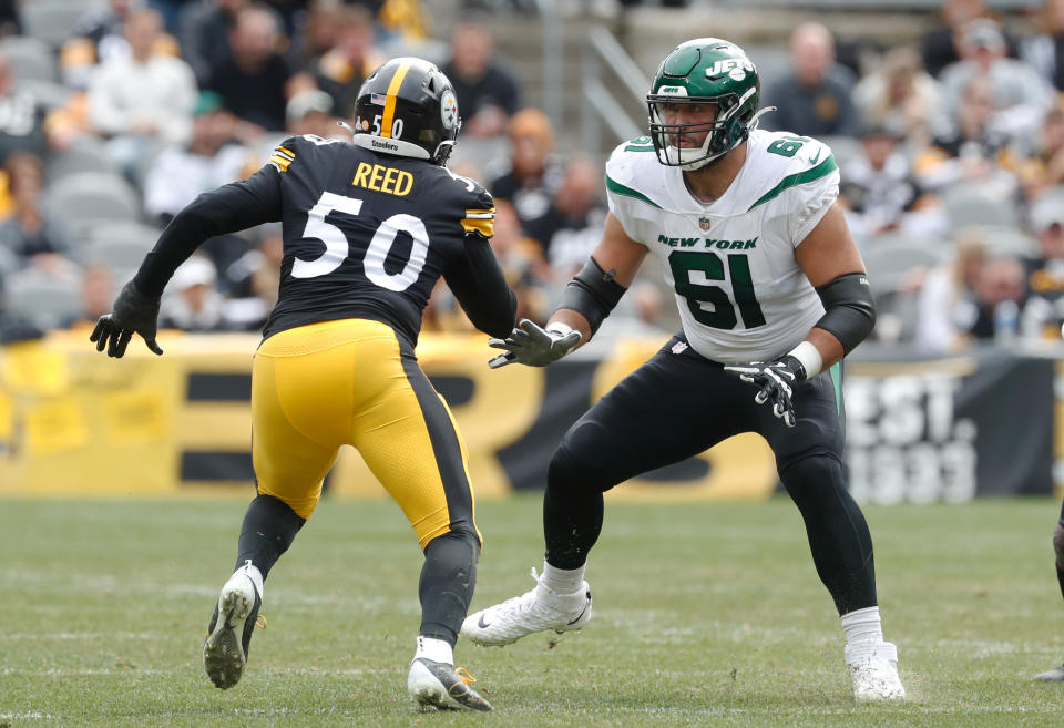 Oct 2, 2022; Pittsburgh, Pennsylvania, USA; New York Jets offensive tackle <a class="link " href="https://sports.yahoo.com/nfl/players/34067" data-i13n="sec:content-canvas;subsec:anchor_text;elm:context_link" data-ylk="slk:Max Mitchell;sec:content-canvas;subsec:anchor_text;elm:context_link;itc:0">Max Mitchell</a> (61) blocks at the line of scrimmage against Pittsburgh Steelers linebacker <a class="link " href="https://sports.yahoo.com/nfl/players/32220" data-i13n="sec:content-canvas;subsec:anchor_text;elm:context_link" data-ylk="slk:Malik Reed;sec:content-canvas;subsec:anchor_text;elm:context_link;itc:0">Malik Reed</a> (50) during the second quarter at Acrisure Stadium. Mandatory Credit: Charles LeClaire-USA TODAY Sports