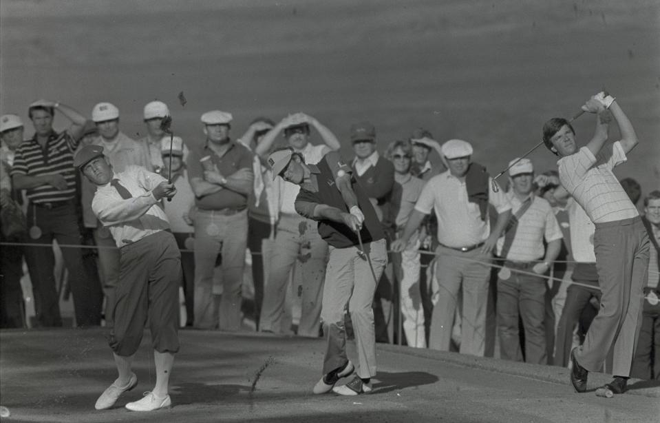 Golfers on the practice driving range at the Augusta National Golf Course during the 1984 Masters.