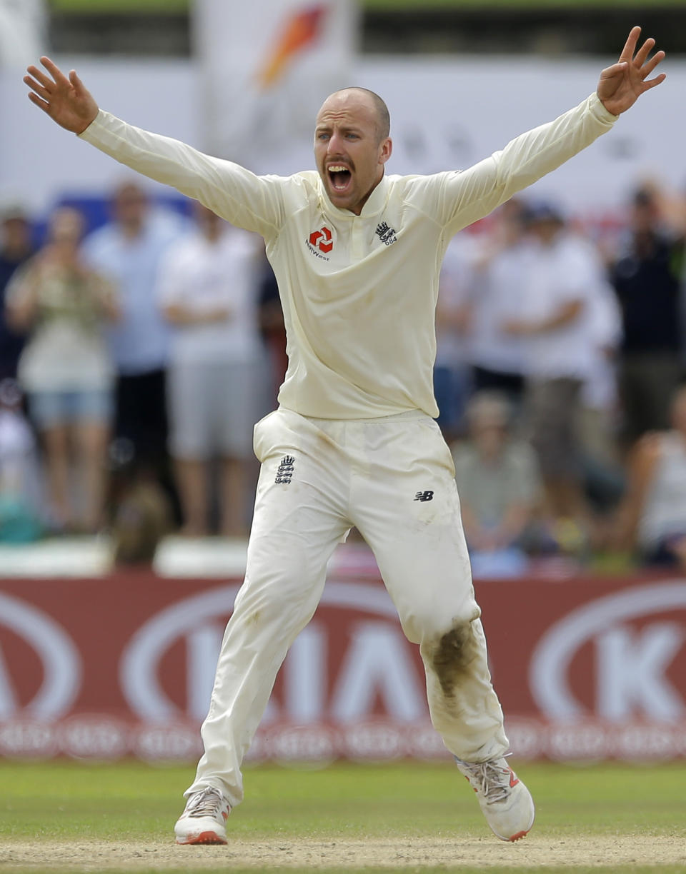 England's Jack Leach successfully appeals to dismiss Sri Lanka's Kaushal Silva during the fourth day of the first test cricket match between Sri Lanka and England in Galle, Sri Lanka, Friday, Nov. 9, 2018. (AP Photo/Eranga Jayawardena)