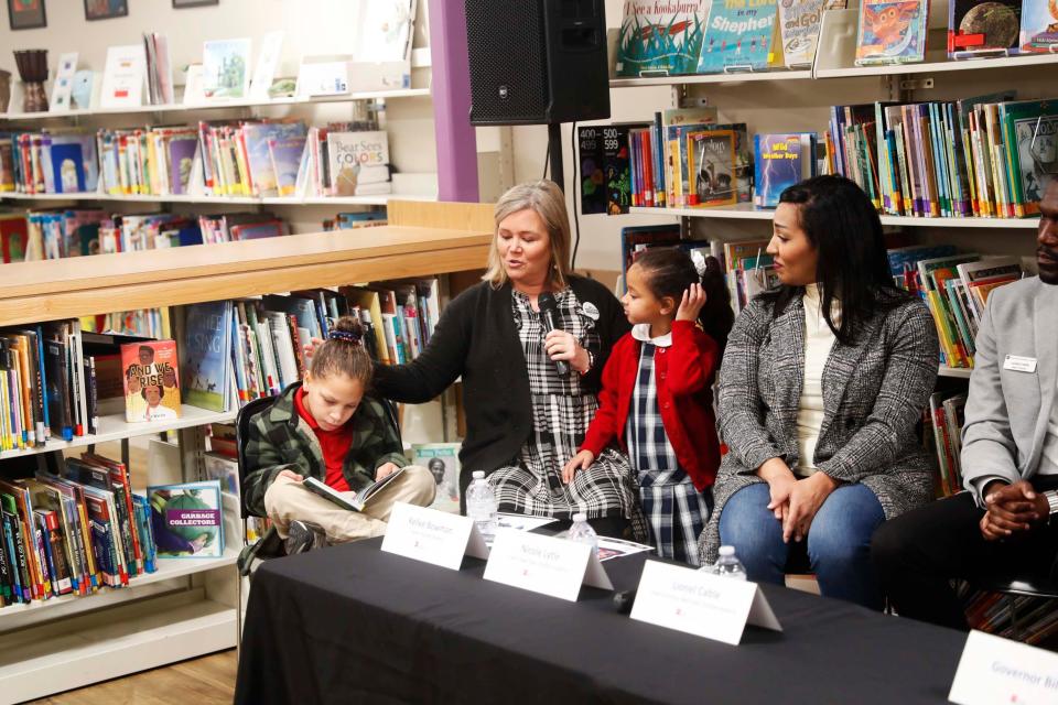 Parent Kellee Bowman speaks about her experience with the school vouchers during a panel consisting of the head of New Hope Christian Academy, Governor Bill Lee, and Speaker Cameron Sexton on Wednesday, December 13, 2023 at the New Hope Christian Academy library in Memphis, Tenn.