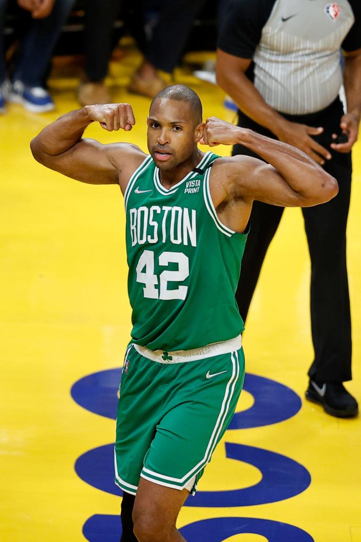 Boston Celtics center Al Horford (42) celebrates during the second half of Game 1 of basketball's NBA Finals against the Golden State Warriors in San Francisco, Thursday, June 2, 2022. (AP Photo/John Hefti) ORG XMIT: CAJC179