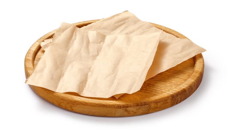 Parchment paper on board
