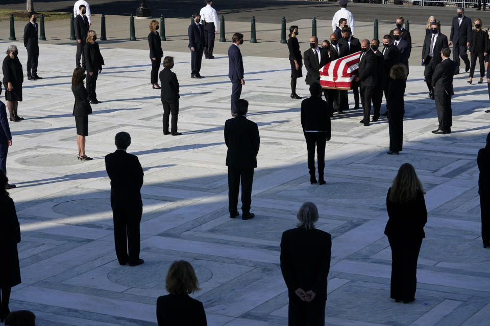 The flag-draped casket of Justice Ruth Bader Ginsburg arrives at the Supreme Court in Washington, Wednesday, Sept. 23, 2020. Ginsburg, 87, died of cancer on Sept. 18. (AP Photo/Alex Brandon, Pool)