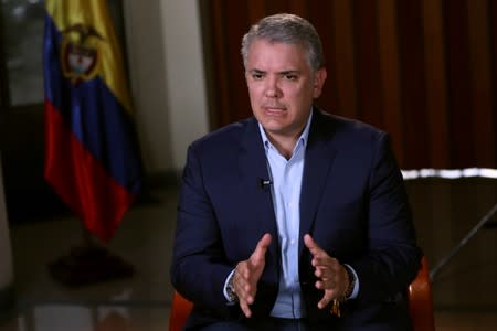 Colombia’s President Ivan Duque speaks during an interview with Reuters in Bogota