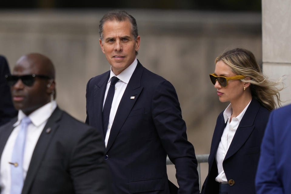 Hunter Biden, center, departs from federal court with his wife, Melissa Cohen Biden, right, Thursday, June 6, 2024, in Wilmington, Del. (AP Photo/Matt Slocum)