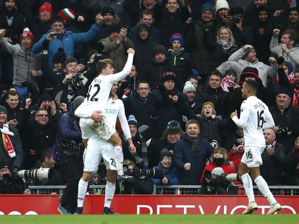 Gylfi Sigurdsson celebrates after scoring Swansea's winning goal against Liverpool (Getty)