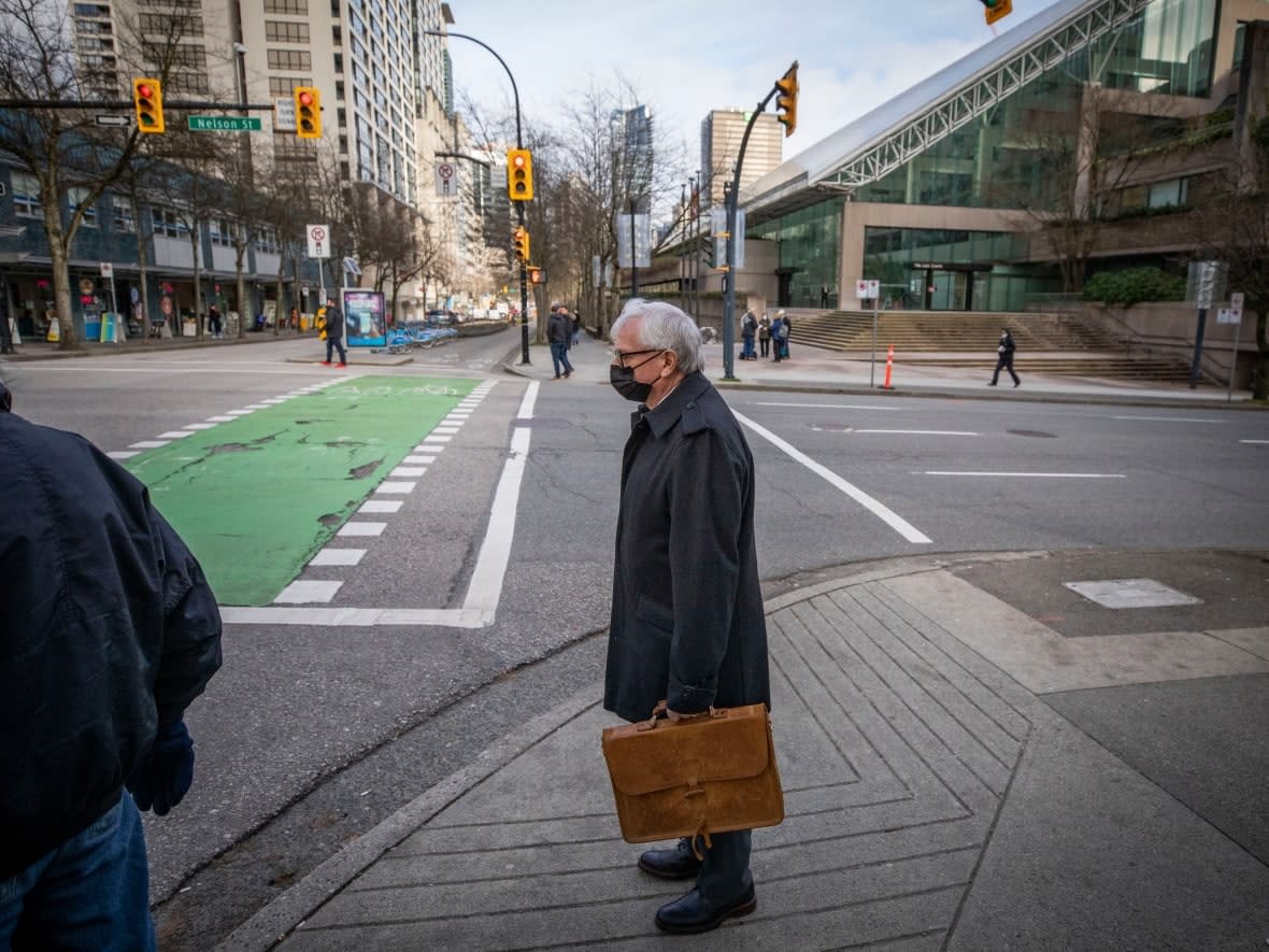 Former B.C. legislative assembly clerk Craig James is pictured leaving B.C. Supreme Court during the first week of his breach of trust trial. (Ben Nelms/CBC - image credit)