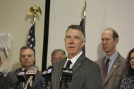 FILE— In this June 14, 2021 file photo Vermont Republican Gov. Phil Scott speaks at a news conference in Montpelier, Vt. California could witness a stunning turnabout if voters dump Democratic Gov. Gavin Newsom and elects a Republican to fill his job in the September recall election. It is rare to see Republican's win the governor's office in solidly Democratic states, but Scott is one of three Republicans, along with Massachusetts Gov. Charlie Baker and Maryland Gov. Larry Hogan do so. (AP Photo/Wilson Ring, File)