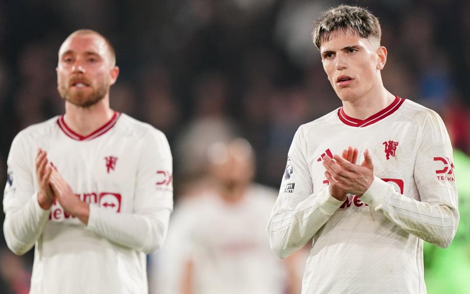 Manchester United's Christian Eriksen and Alejandro Garnacho applauds their fans