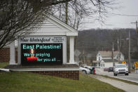 This is a sign outside the New Waterford, Ohio, United Methodist Church on Monday, Feb. 6, 2023, in support of neighboring community East Palestine, Ohio, that has been evacuated due to burning tank cars from a Norfolk and Southern derailment that took place Friday night. (AP Photo/Gene J. Puskar)