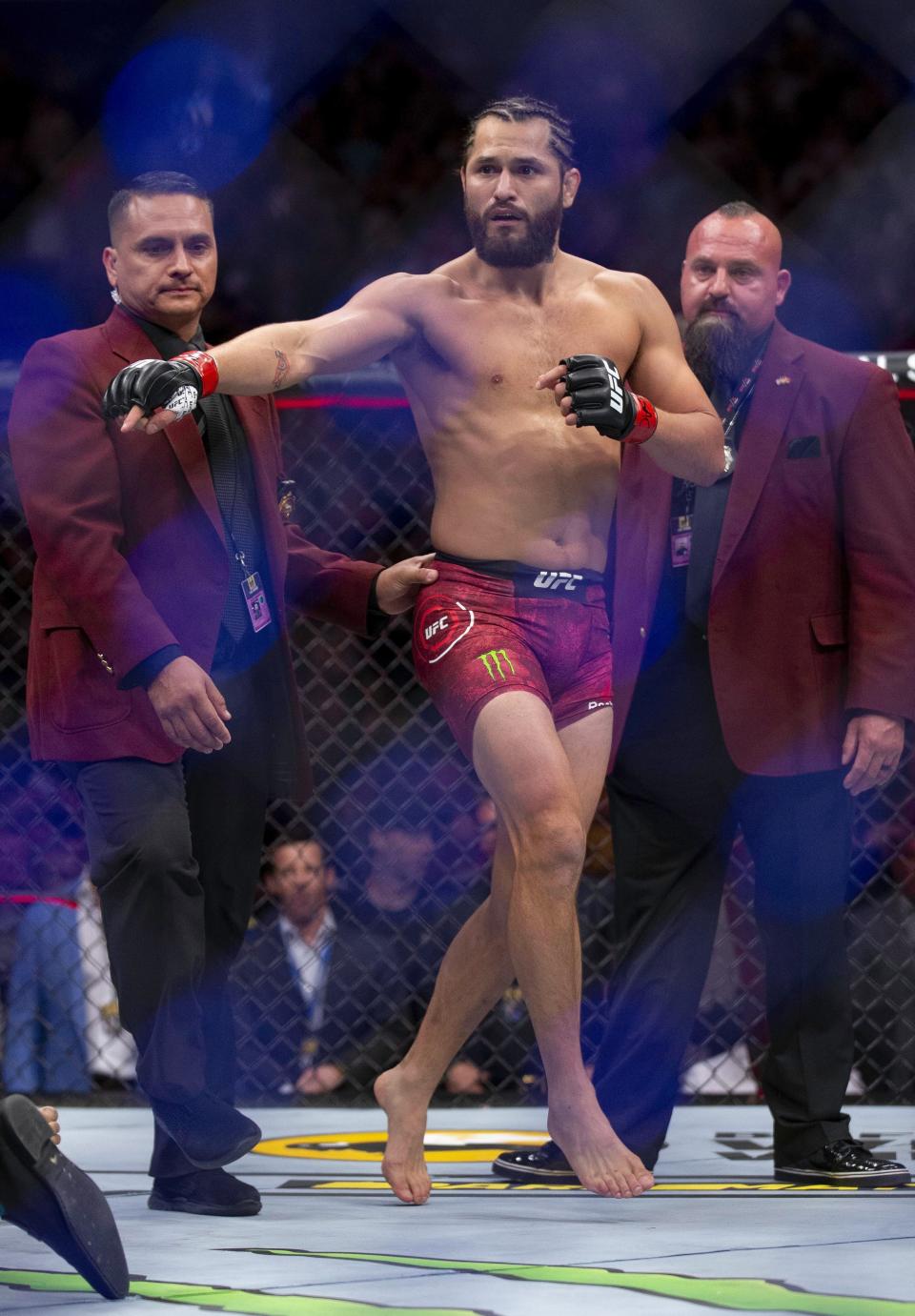 Jorge Masvidal celebrates his knockout victory over Ben Askren during their welterweight mixed martial arts bout at UFC 239, Saturday, July 6, 2019, in Las Vegas. Masvidal won by the fastest knockout in UFC history. (AP Photo/Eric Jamison)