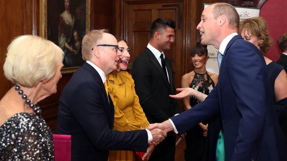 Prince William, Duke of Cambridge greets Jason Watkins as he attends the Child Bereavement 25th birthday gala dinner at Kensington Palace 