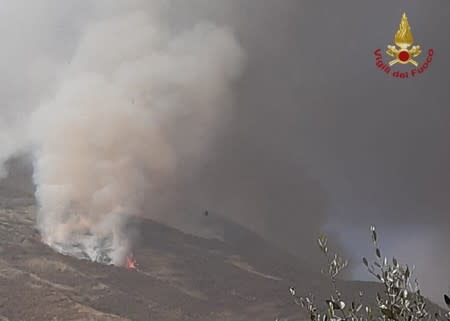 Smoke rises from a volcano on the island of Stromboli after an explosion in Stromboli