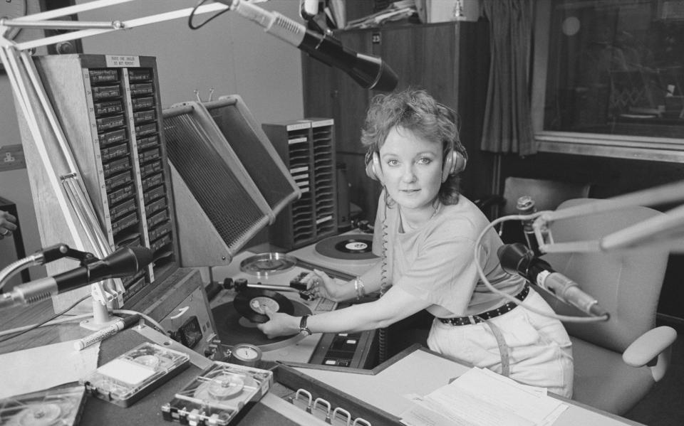 Janice Long, pictured in a BBC radio studio in Broadcasting House, London on 10th August 1983 - Popperfoto 