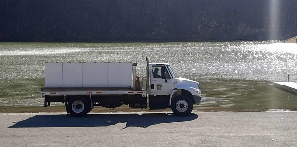 A Pennsylvania Fish and Boat Commission trout stocking truck delivered fish Feb. 24 to Laurel Hill Lake in Somerset County. Trout season opens statewide April 1.