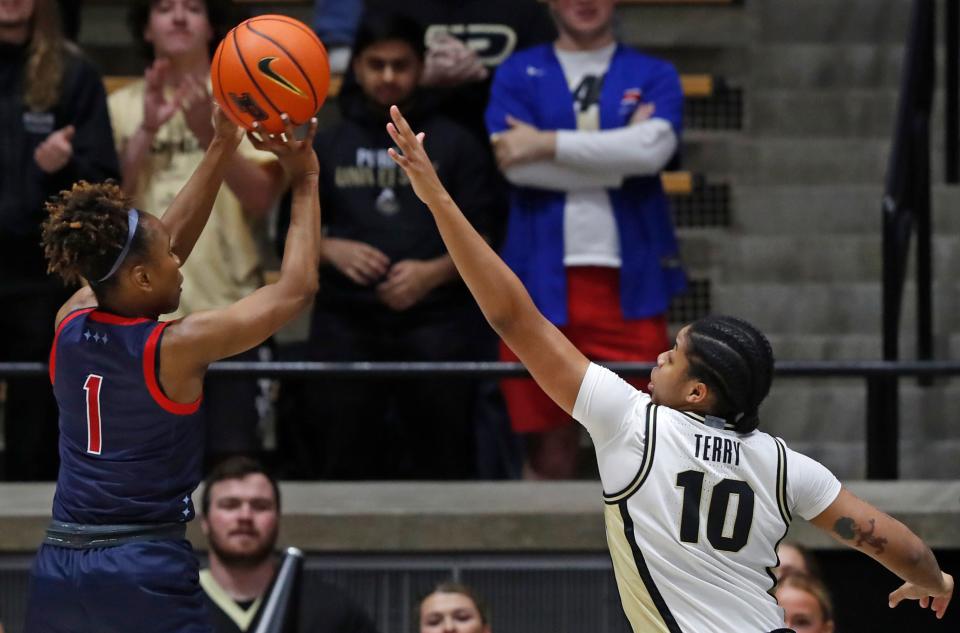 Duquesne Dukes guard Jerni Kiaku (1) shoots the ball past Purdue Boilermakers guard Jeanae Terry (10) during the NCAA WNIT basketball game, Thursday, March 28, 2024, at Mackey Arena in West Lafayette, Ind.