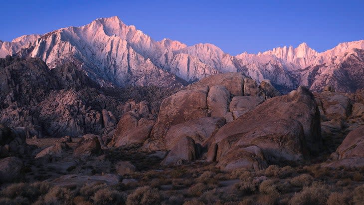 Sunrise casts light onto the Eastern Sierras in California