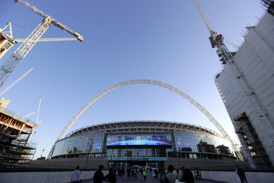 A view of the exterior of Wembley Stadium in London, Wednesday, Oct. 3, 2018. Britain is looking to host up to 60 major sporting events over the next 15 years, including soccer’s World Cup, to assert global influence and secure trade deals after Brexit. Building on the successful of the 2012 Olympics in London and the English Premier League, hosting major sporting events is now embraced as a key instrument of soft power by British Prime Minister Thresa May’s government. The UK Sport list of sporting events being targeted was revealed hours after May’s speech to her Conservative Party conference, with the centerpiece the 2030 World Cup. (AP Photo/Kirsty Wigglesworth)