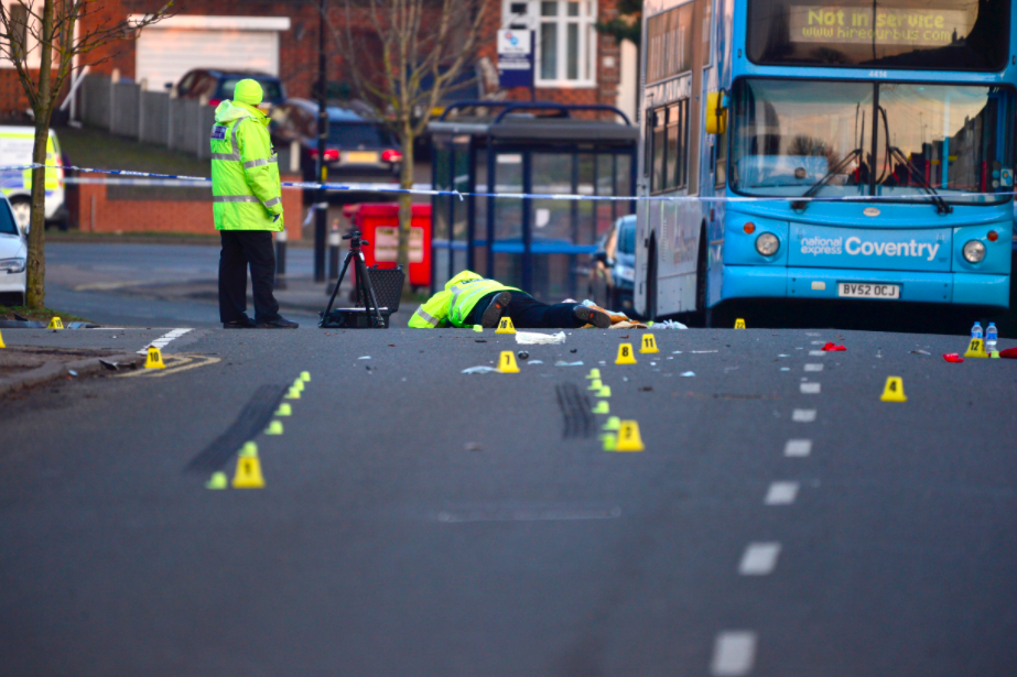 Police on the scene on MacDonald Road in Coventry where Corey and Casper Platt-May were killed (SWNS)