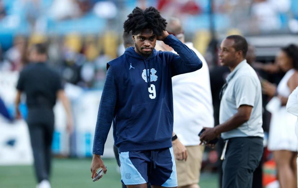 North Carolina wide receiver Tez Walker (9) walks down the field before UNC’s game against South Carolina in the Duke’s Mayo Classic at Bank of America Stadium in Charlotte, N.C., Saturday, Sept. 2, 2023. Ethan Hyman/ehyman@newsobserver.com