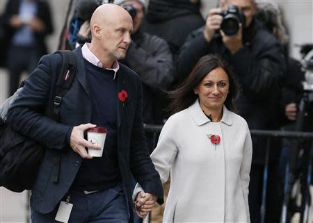 Cheryl Carter (R), the former personal assistant of former News International chief executive Rebekah Brooks, arrives at the Old Bailey courthouse in London November 1, 2013. REUTERS/Stefan Wermuth