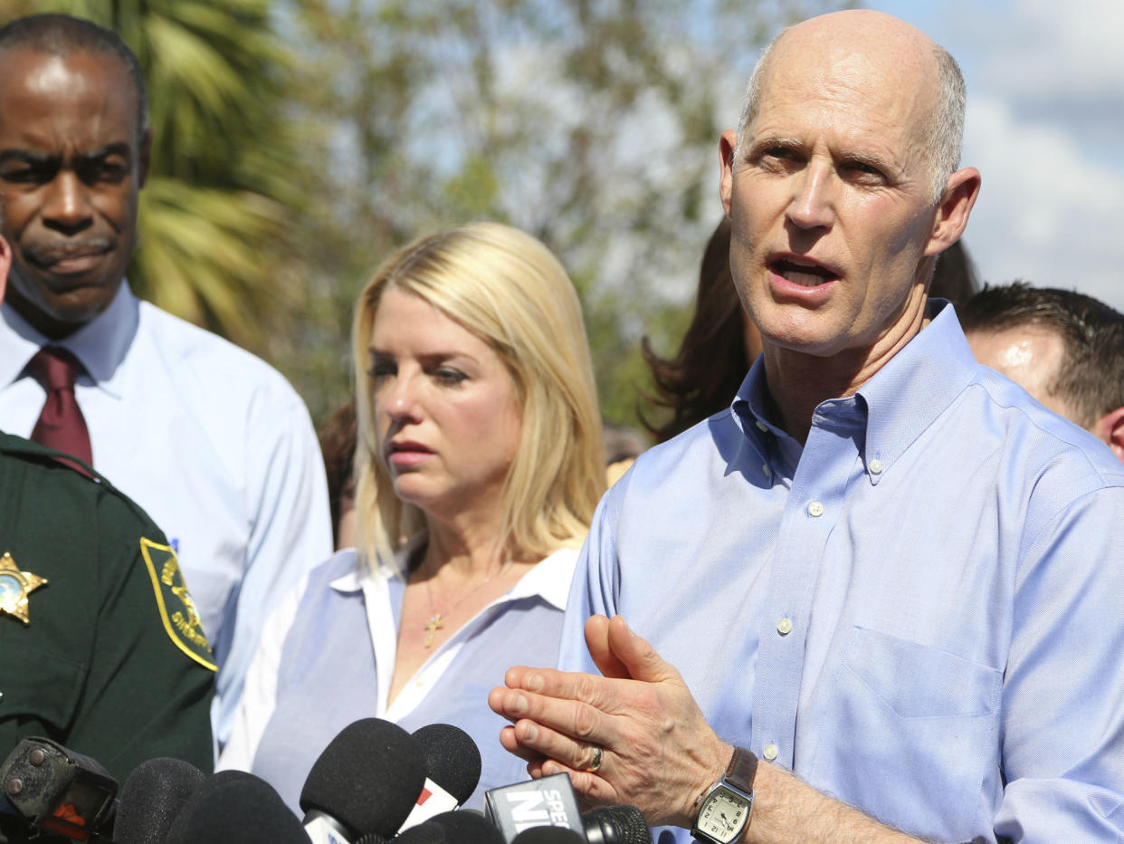 Florida Gov. Rick Scott speaks about the shooting at Marjory Stoneman Douglas High School: Amy Beth Bennett/South Florida Sun-Sentinel via AP