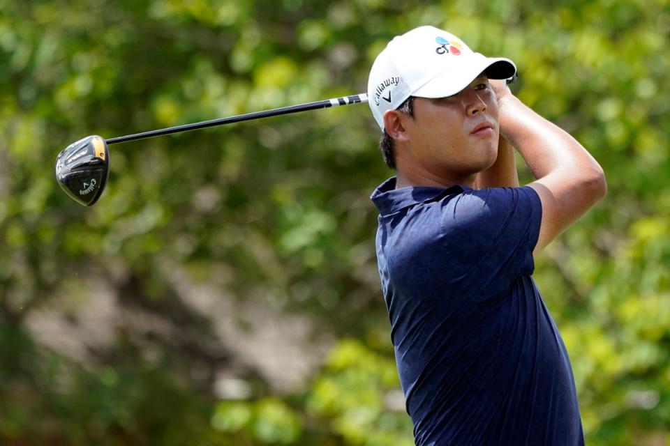 Si Woo Kim marked a strong start to the FedEx Cup play-offs with an eagle as he carded an eight-under 62 and snatched a share of the lead with JJ Spaun (Mark Humphrey/AP) (AP)