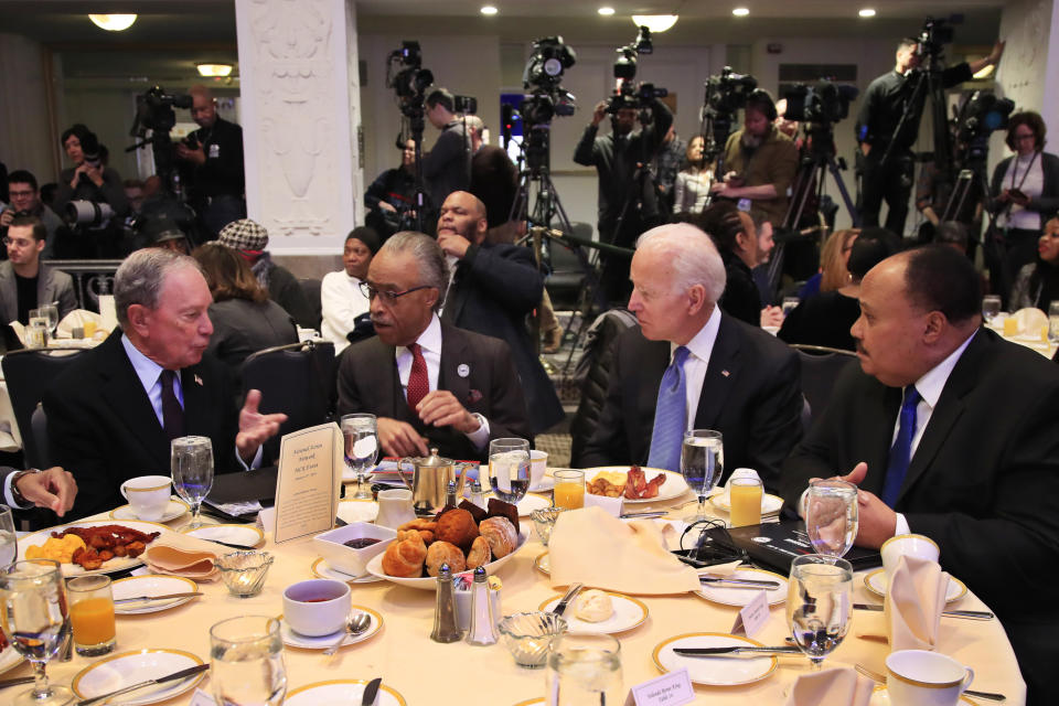 From left, former New York City Mayor Michael Bloomberg, Rev. Al Sharpton, former Vice President Joe Biden and Martin Luther King Jr III, are gathered during a commemoration of Martin Luther King Day in Washington, Monday, Jan. 21, 2019. (AP Photo/Manuel Balce Ceneta)