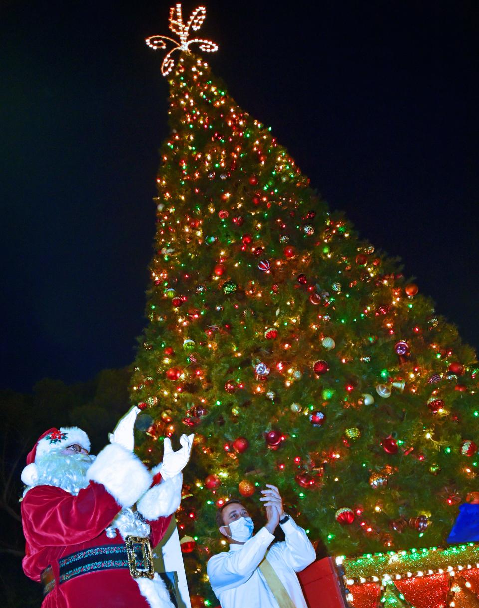 Santa and Sarasota City Commissioner Hagen Brody, who was also serving as the city's ceremonial mayor, flipped the switch to light up a 55-foot Christmas tree during a St. Armands Circle holiday season tree lighting ceremony in December 2020. The St. Armands Circle Association recently announced that the annual Holiday Night of Lights will not take place this year, and cited restrictions caused by a new Winter Spectacular event scheduled to be held in the Circle.
