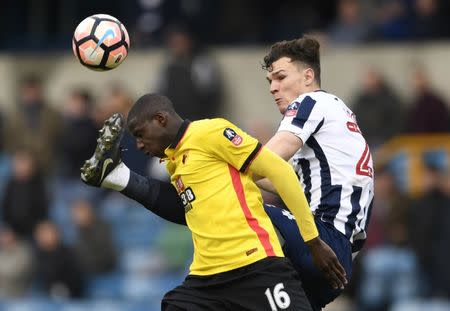 Britain Football Soccer - Millwall v Watford - FA Cup Fourth Round - The New Den - 29/1/17 Watford's Abdoulaye Doucoure in action with MIllwall's Jake Cooper Action Images via Reuters / Tony O'Brien Livepic EDITORIAL USE ONLY. No use with unauthorized audio, video, data, fixture lists, club/league logos or "live" services. Online in-match use limited to 45 images, no video emulation. No use in betting, games or single club/league/player publications. Please contact your account representative for further details.