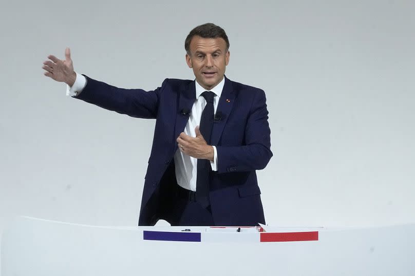 French President Emmanuel Macron answers questions after delivering a speech in Paris, 12 June 2024