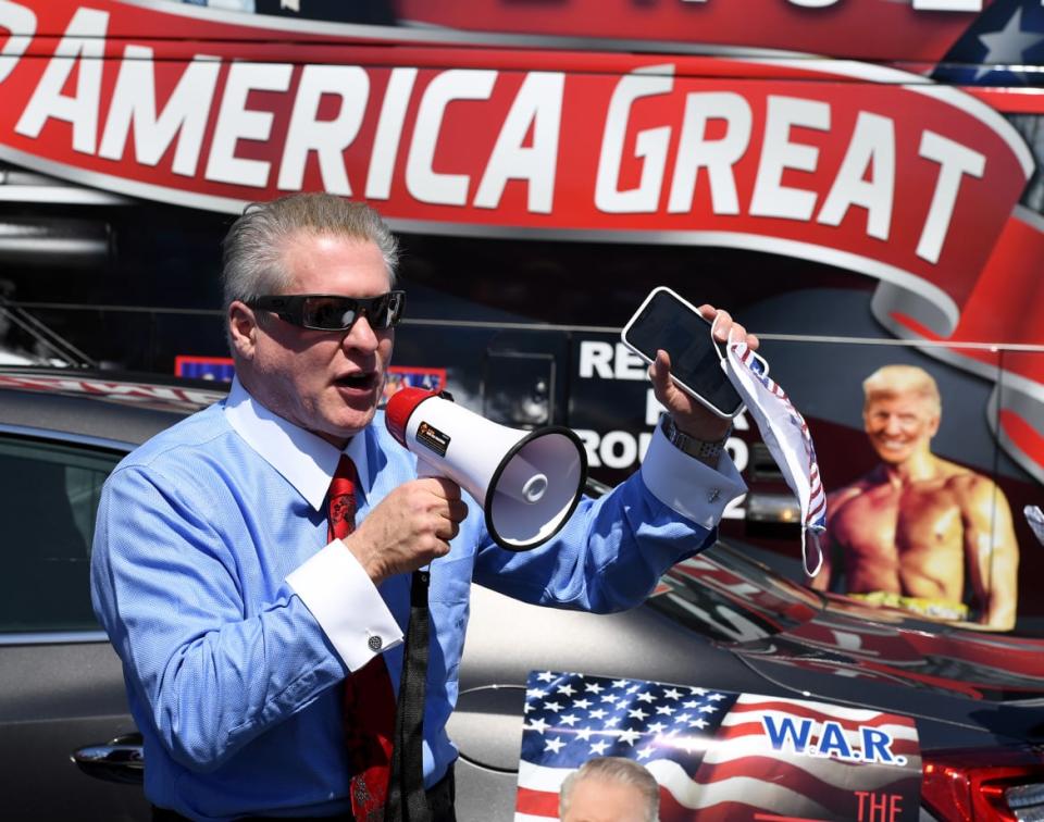 <div class="inline-image__caption"><p>Conservative radio talk show host Wayne Allyn Root speaks on the Las Vegas Strip to demand the reopening of the Nevada economy, hit hard by coronavirus-related closures, on April 24, 2020 in Las Vegas, Nevada. </p></div> <div class="inline-image__credit">Ethan Miller/Getty Images</div>