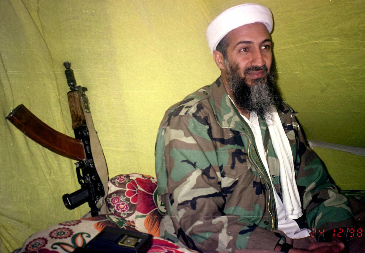 Muslim militant and Al Quida leader Osama Bin Laden speaks to a selected group of reporters in mountains of Helmand province in southern Afghanistan in 1998. (Rahimullah Yousafzai/AP)