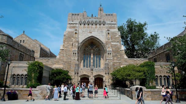 PHOTO: A tour group makes a stop at the Sterling Memorial Library on the Yale University campus in New Haven, June 12, 2015. (Craig Warga/Bloomberg via Getty Images, FILE)