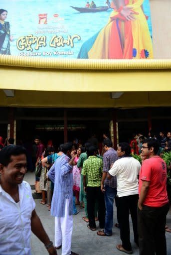 Cinema goers gather at a movie theatre in Dhaka. A bold new film by the country's best known novelist and filmmaker is shedding light on historic "Ghetu" males who served as bed partners for rich Muslims