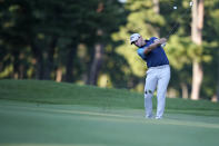 Matt Wallace of England hits a shot on the 18nd hole during the third round of the Zozo Championship golf tournament at Accordia Golf Narashino Country Club on Saturday, Oct. 23, 2021 in Inzai, Chiba prefecture, Japan. (AP Photo/Tomohiro Ohsumi)